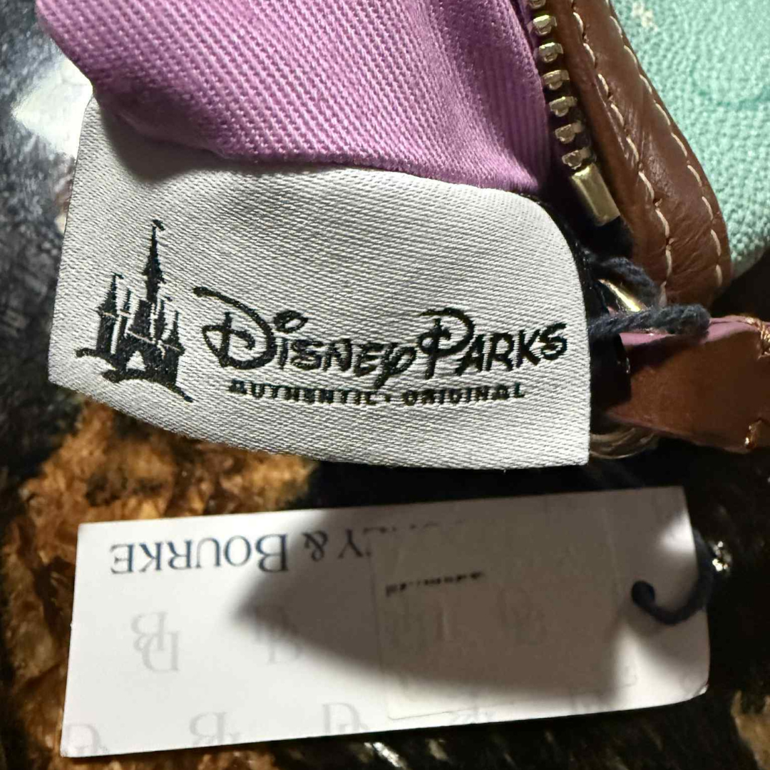 6 Disney Parks Authentic Original label confirming official collaboration with Dooney & Bourke.