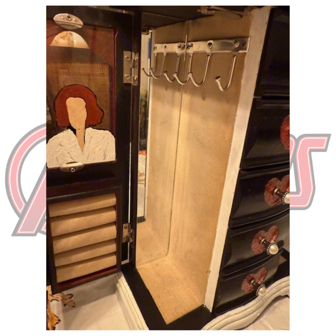 Interior close-up of Black Widow door with hooks for necklaces