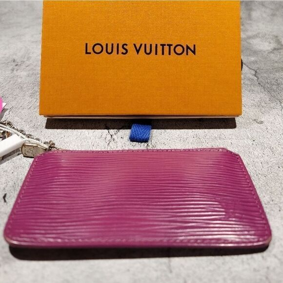m_68b67edfc4e7b45537b51a12 Louis Vuitton Epi Leather Cles or Key Pouch in the Color Grenade Authentic