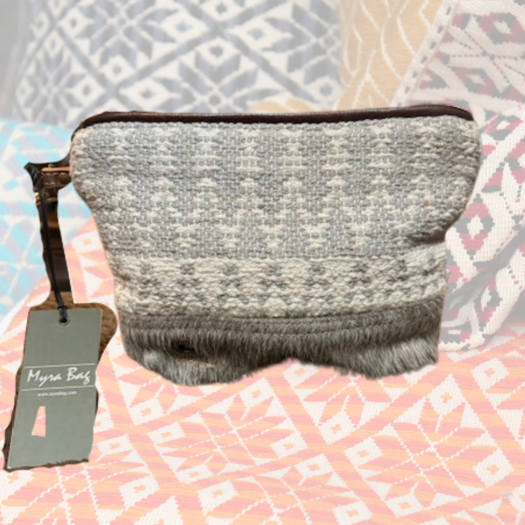 Front view of Myra Bag Patsy Pouch with woven gray fabric and hair-on-hide trim