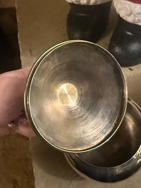 vintage-silverplate-lid-interior-detail.jpg Interior of the silverplated lid showing circular brushed finish and vintage patina.